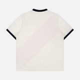 A short-sleeve ivory USA Football Jersey by LES DEUX, featuring a subtle diagonal stripe pattern with black trim on the collar and cuffs, is displayed flat against a white background.