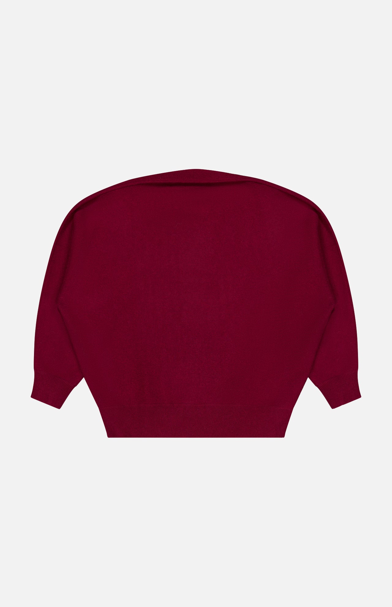 The Hally Cashmere Sweater by LISA YANG, featuring a plain design in dark red pure cashmere with long sleeves, is displayed laid flat on a white background to show the back side, highlighting its wide shoulders and ribbed cuffs and hem.