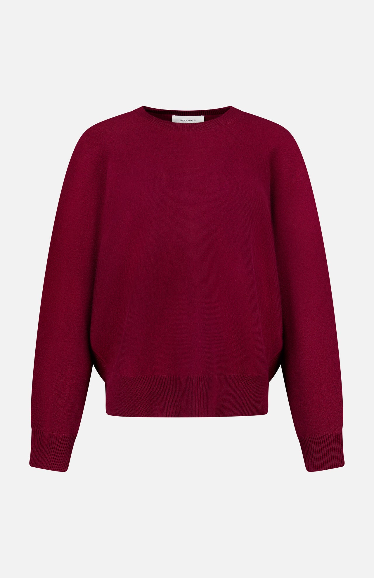 The LISA YANG Hally Cashmere Sweater is a plain, long-sleeved crew neck style in a rich burgundy hue, exemplifying slow luxury and shown against a white background.