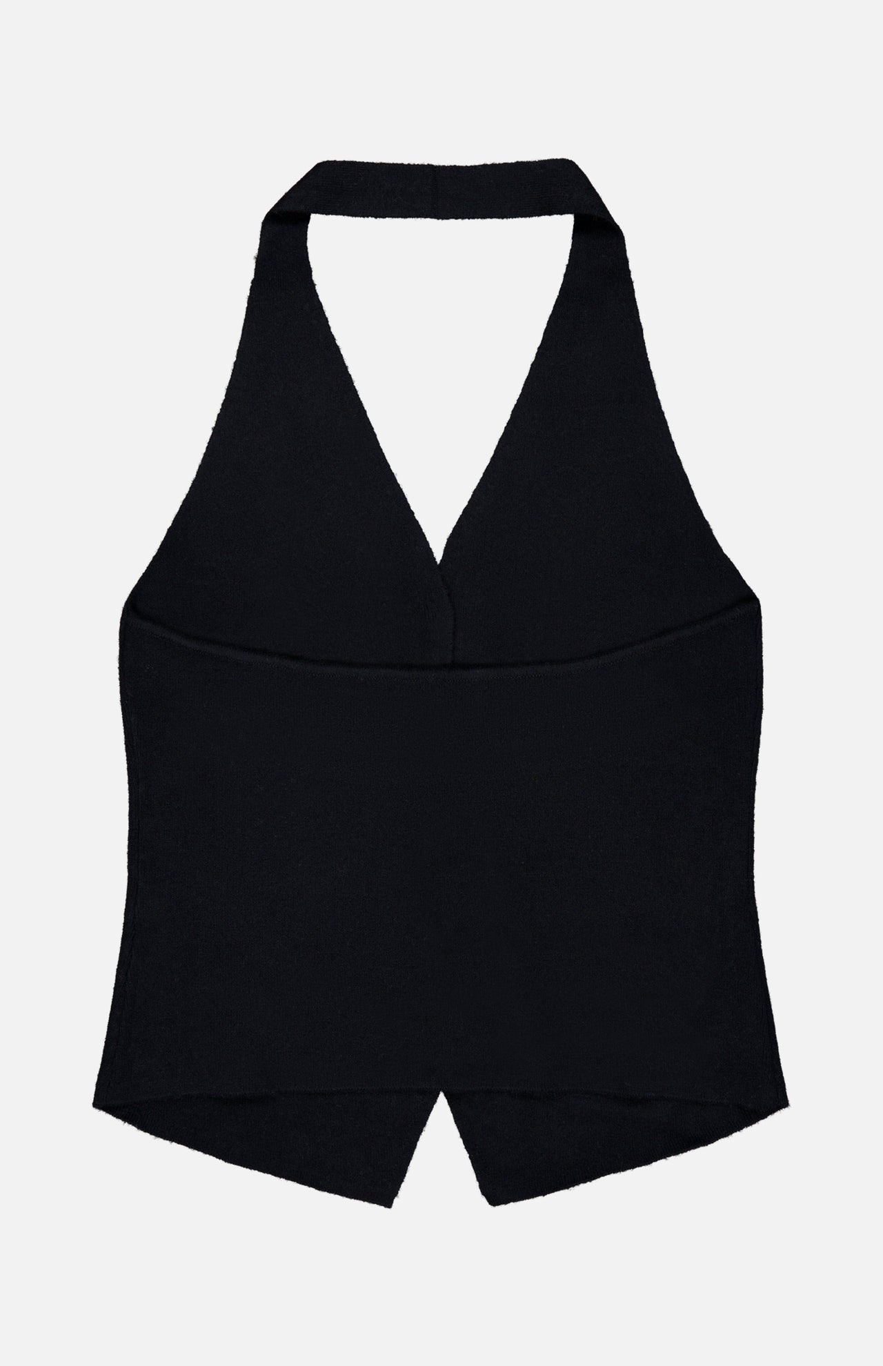 The Immy Halter Top by LISA YANG is a sleeveless black design inspired by a cashmere vest, featuring a deep V-neckline and a pointed front hem. Laid flat on a white background, this timeless piece embodies the essence of slow luxury.