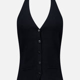 The Immy Halter Top by LISA YANG is a black cashmere vest with a halter-neck design, five front buttons, a deep V-neckline, and two small front pockets, displayed on a plain white background—a refined piece from this slow luxury brand.