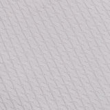 Close-up of the Lora Cashmere Tank Top by LISA YANG, showcasing its light gray cableknit cashmere fabric with a repeating twisted cable pattern viewed at an angle. The texture appears soft and slightly raised, evoking the cozy feel typical of luxury knitwear.