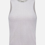 LISA YANG’s Lora Cashmere Tank Top is a sleeveless white cable-knit sweater vest featuring a round neckline, shown against a plain white background.
