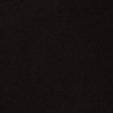 Close-up of the Mable Cashmere Sweater in dark brown, featuring a ribbed crew neckline and a white LISA YANG label sewn inside the collar, exemplifying a refined Scandinavian aesthetic.
