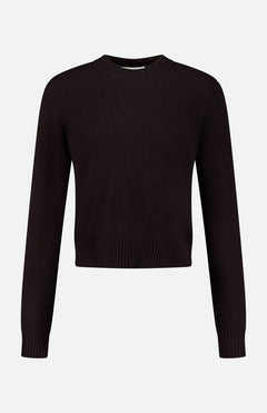 The LISA YANG Mable Cashmere Sweater—a minimalist black long-sleeve knit featuring a crew neckline, ribbed cuffs, and a ribbed hem that reflects Scandinavian-inspired slow luxury—is displayed against a white background.