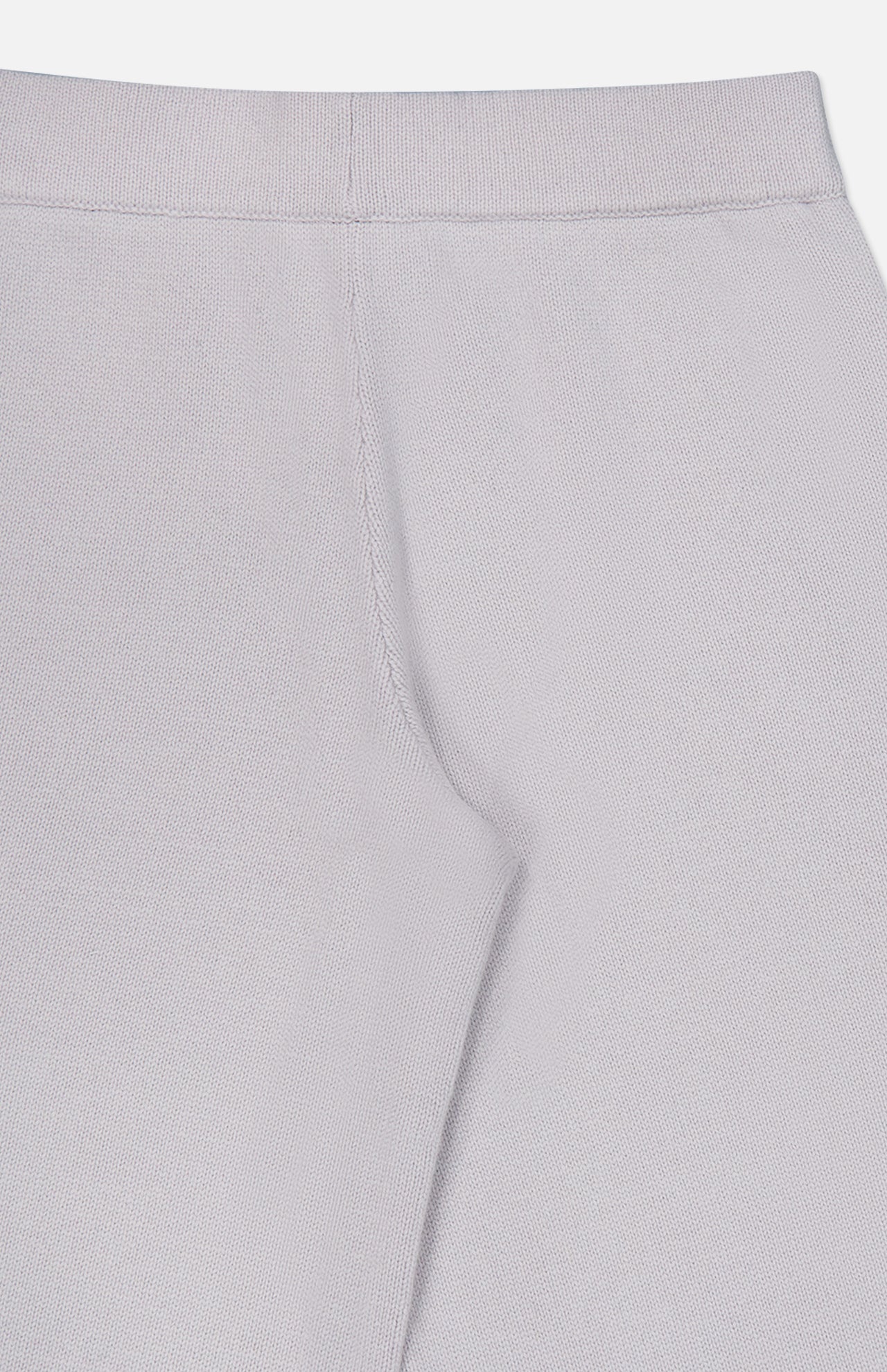 Close-up view of the light gray Olanda Cashmere Wide-leg Pant by LISA YANG, highlighting the waistband and center seam details, reminiscent of classic minimalist cashmere pants.