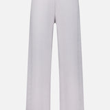 The Olanda Cashmere Wide-leg Pant by LISA YANG features a light gray color, high-rise waist, wide leg silhouette, and subtle vertical texture, crafted from a minimalist cashmere blend and shown against a plain white background.