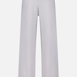 The Olanda Cashmere Wide-leg Pant by LISA YANG is shown from the back in light grey, showcasing its high waist, full length, and relaxed fit. Displayed on a plain white background, these minimalist pants blend effortless sophistication with luxurious comfort.
