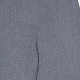 The Shannen Wide Leg Cashmere Pants by LISA YANG are shown from the waist to the upper legs. Crafted from a soft cotton-cashmere blend, these gray pants feature a vertical ribbed texture, an elastic waistband, and appear exceptionally comfortable.