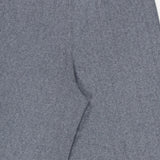 Close-up of the Shannen Wide Leg Cashmere Pants by LISA YANG in gray, highlighting the ribbed knit waistband and upper leg area with a subtle vertical striped texture.