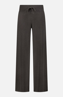 The Sofi Cashmere Drawstring Pant by LISA YANG is a pair of wide-leg, ankle-length black pants featuring a ribbed elastic waistband and drawstring tie, designed in the spirit of slow luxury with Scandinavian influences, presented against a plain white background.