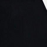 Close-up of the LISA YANG Torie Flared Cashmere Skirt, crafted from luxury knitwear with a smooth texture and simple waistband, set against a white background.
