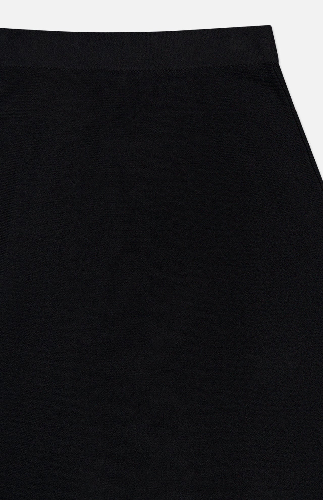 A close-up view of the LISA YANG Torie Flared Cashmere Skirt, highlighting its luxurious knit waistband and upper section in classic black against a white background.