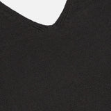 Close-up of the Violia Cashmere Tank Top by LISA YANG in dark brown, highlighting the V-neckline seam and ribbed hem along the bottom edge.