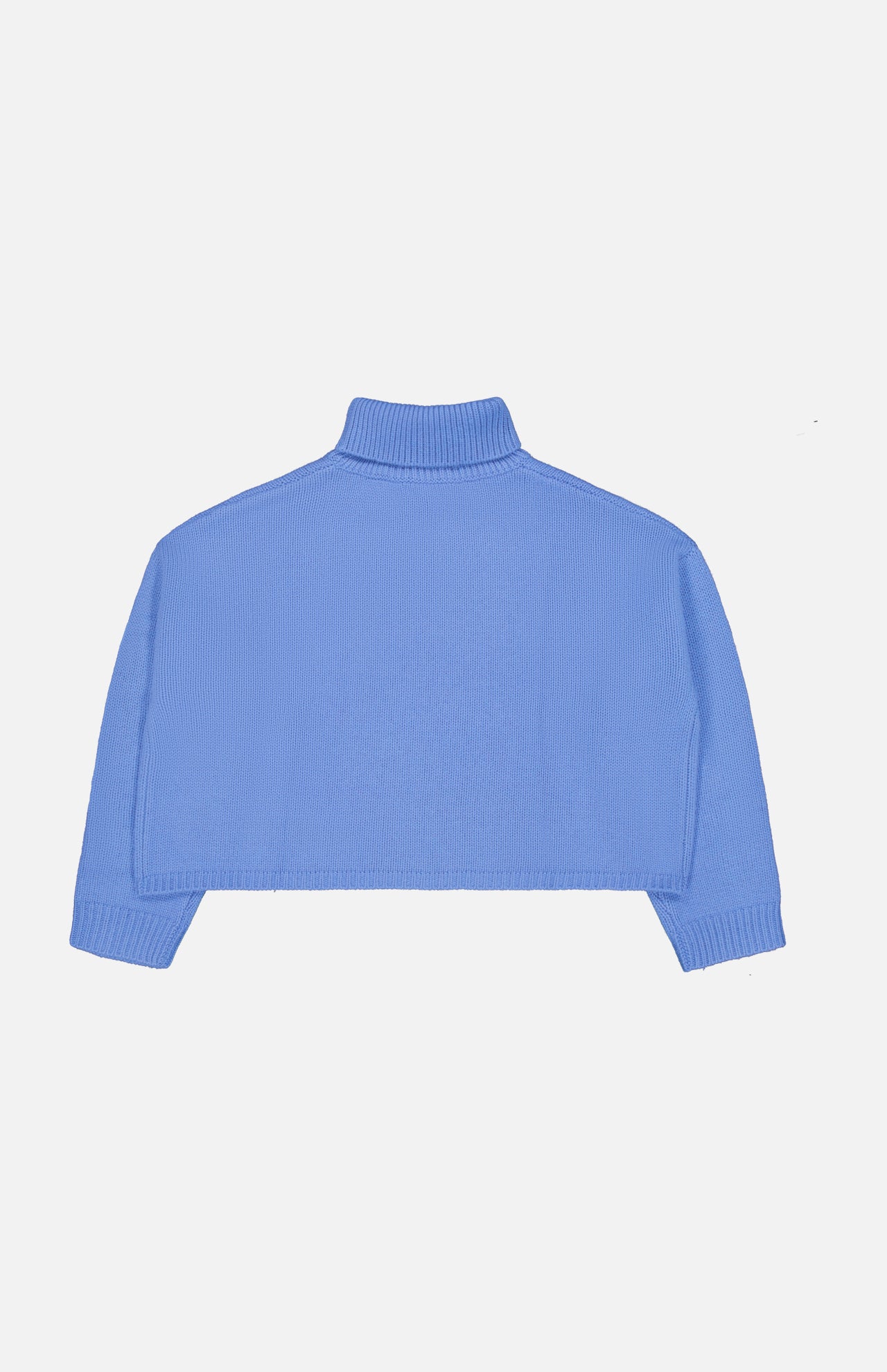 The Zerlina Turtleneck Sweater by LISA YANG—a cropped, long-sleeve, light blue cashmere turtleneck—laid flat on a white background and shown from the back. Crafted from luxurious cashmere, this elegant piece offers a soft and sophisticated touch.
