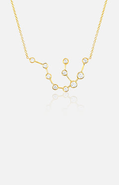 The LOGAN HOLLOWELL Aquarius Diamond Constellation Necklace is a yellow gold piece with small round diamonds forming the zodiac design, displayed on a plain white background.