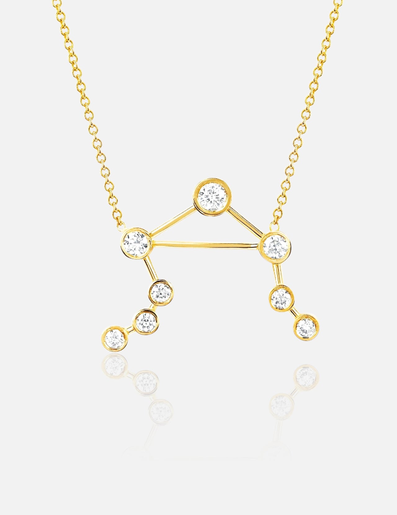 The LOGAN HOLLOWELL Libra Diamond Constellation Necklace features a pendant shaped like the Libra constellation, with sparkling round diamonds at each star point—a beautiful addition to any zodiac jewelry collection.
