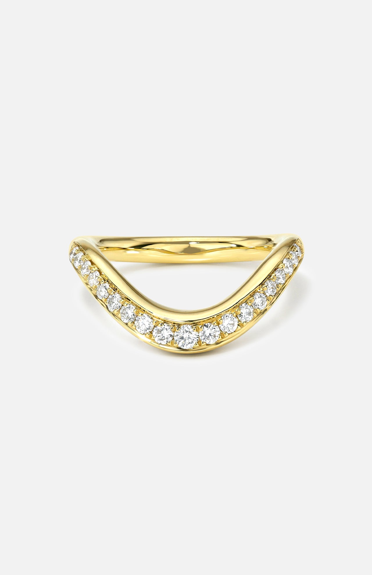 The LOGAN HOLLOWELL Enigma Channel Band Ring features a curved V-shaped band in 18k yellow gold, adorned with a row of sparkling round diamonds, shown against a plain white background.