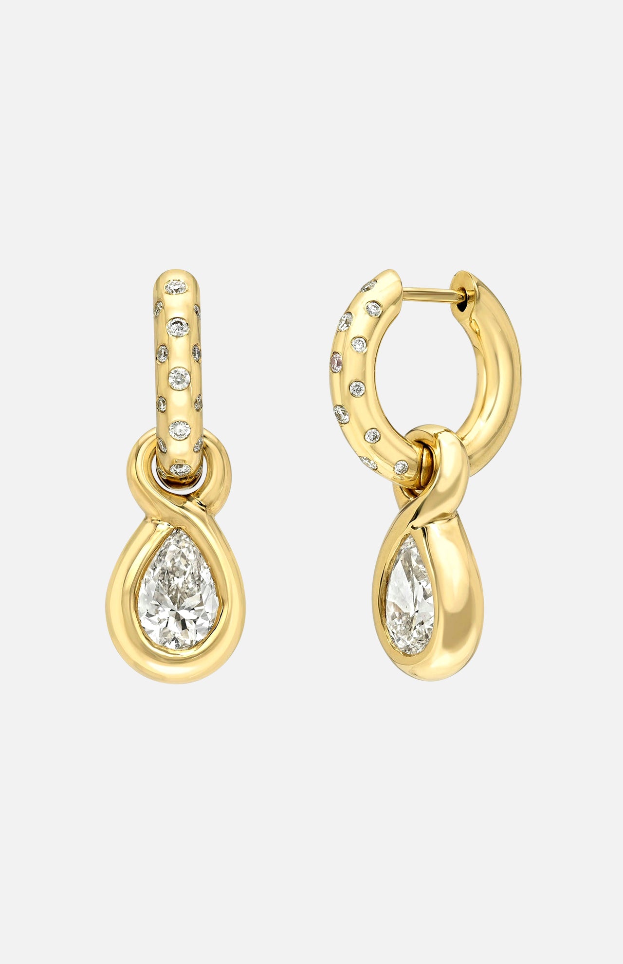 The LOGAN HOLLOWELL Enigma Diamond Oracle Set Water Drop Earrings feature 18k yellow gold hoops with embedded diamonds and a dangling teardrop-shaped diamond, shown against a plain white background.