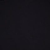 Close-up of the MAJESTIC FILATURES Soft Touch Short Sleeve Crewneck T-Shirt in black, laid flat to highlight the collar and printed neck label with size, care instructions, and “made in Portugal” text.