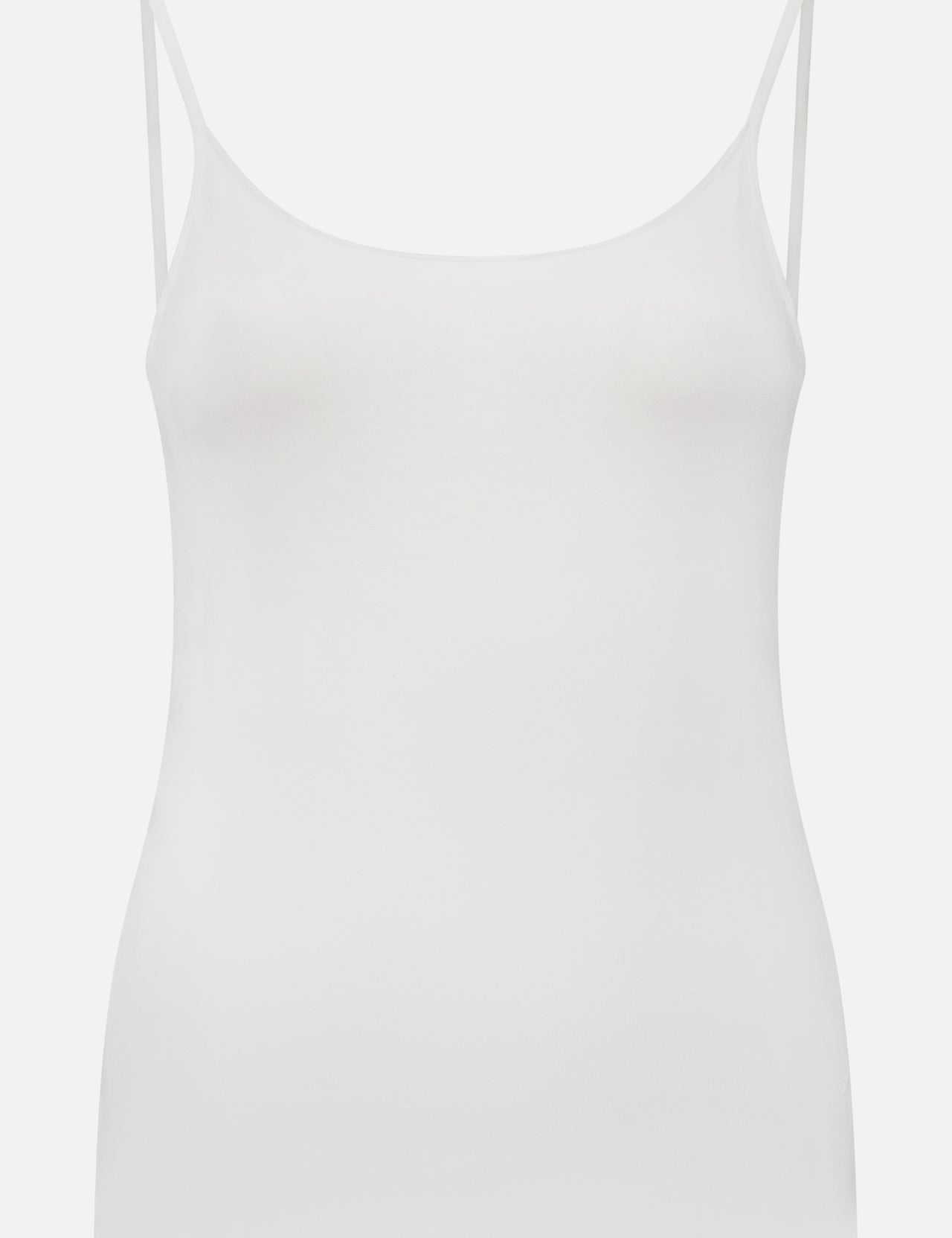 The MAJESTIC FILATURES Soft Touch Tank with Adjustable Straps is a plain white, fitted camisole top featuring thin, adjustable straps and a minimalist design, shown against a white background.