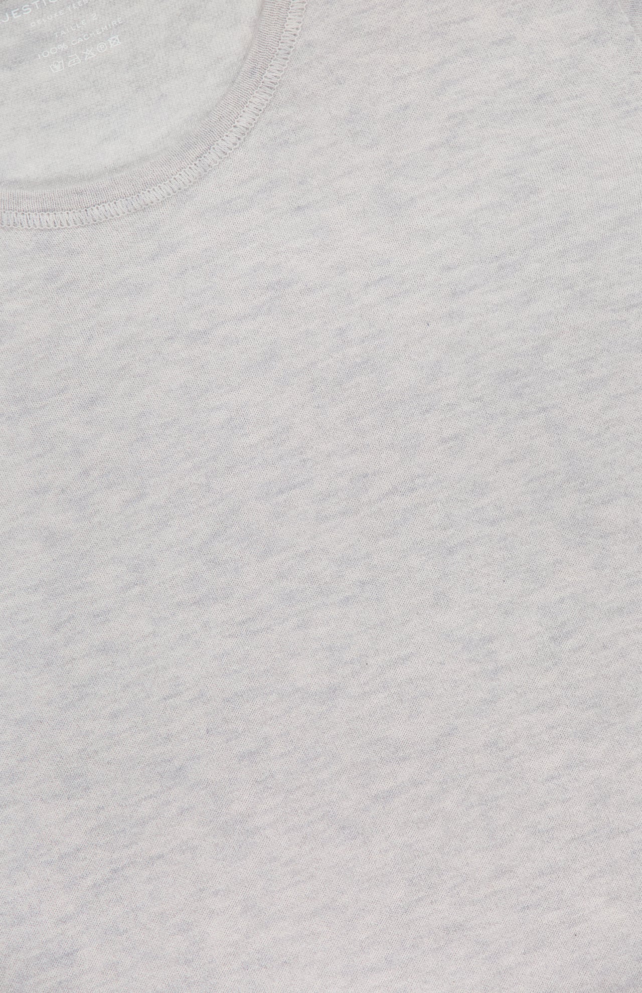 Close-up of the MAJESTIC FILATURES Cashmere Long Sleeve Crewneck T-Shirt in light grey, showcasing its soft, lightweight cashmere fabric and refined stitching details.