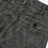 Close-up of the Malcom Cotton Corduroy Trouser Pant in gray and black stripes, made in Italy, featuring a back pocket with a button and belt loops along the waistband.