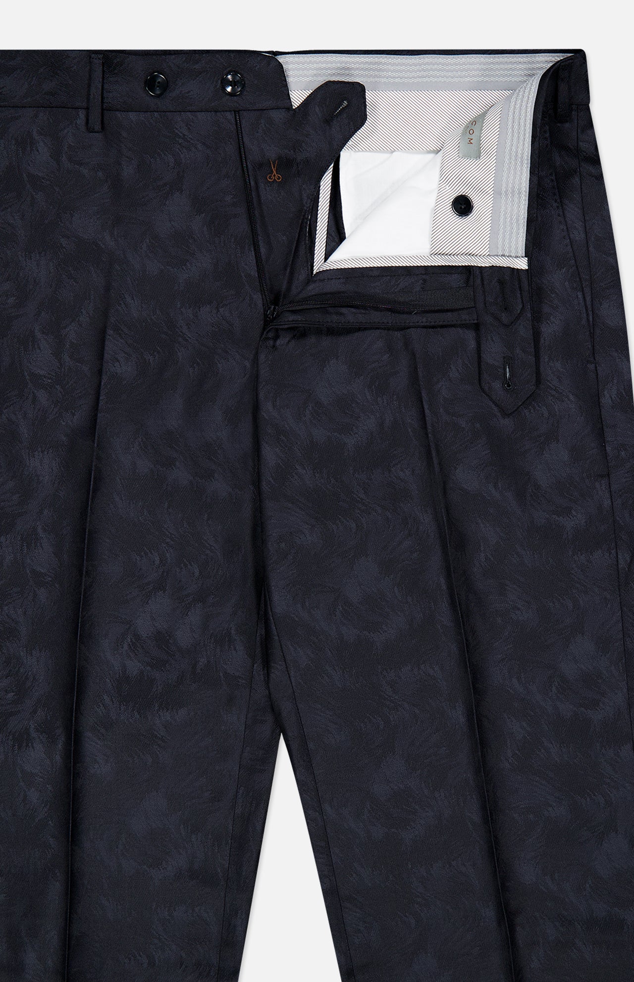 Malcom Wool Stretch Trouser Pant in a dark, subtle feather or foliage print, tailored in a modern tapered fit. The partially open waistband and zipper reveal the inner lining and button closure details, highlighting the luxury craftsmanship reminiscent of fine Italian wool trousers.