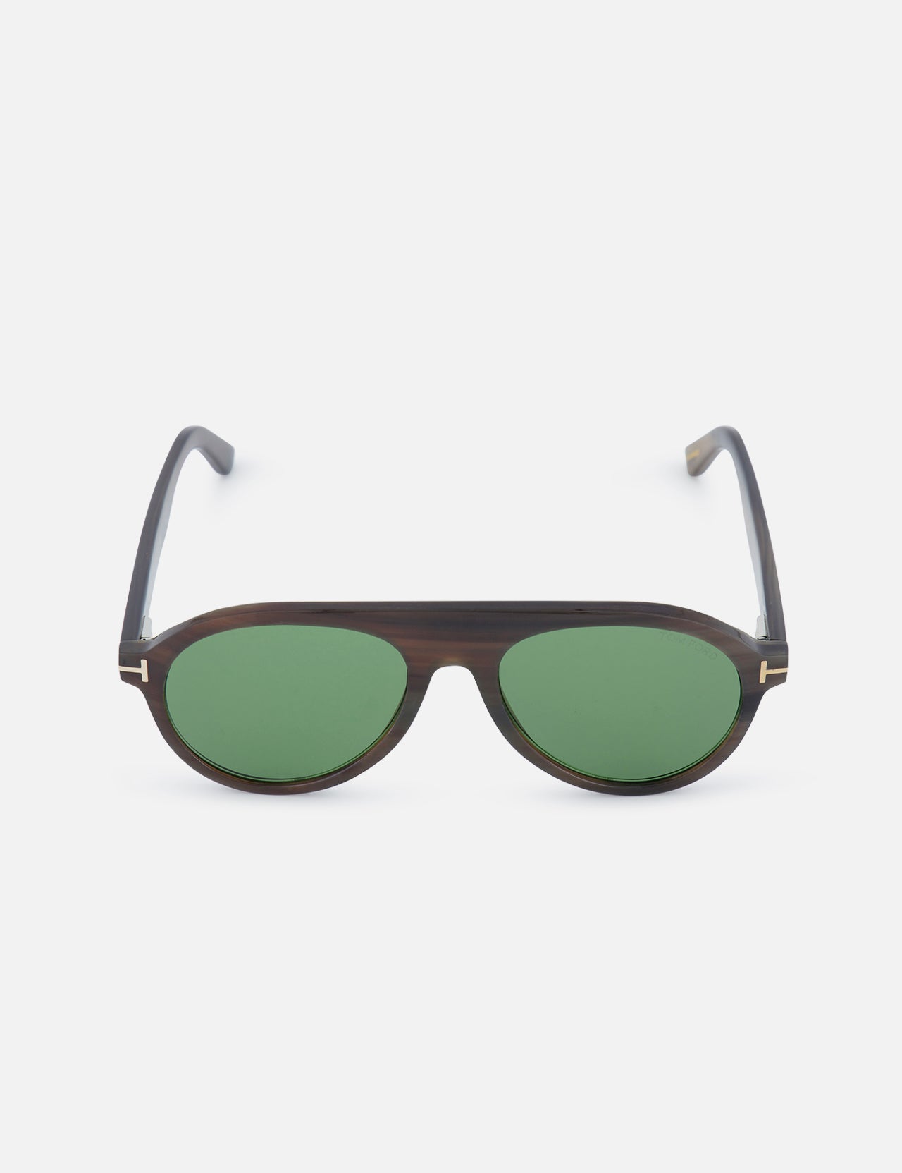 The TOM FORD Aviator Horn Brown Sunglasses feature striped brown frames and dark green lenses, displayed against a plain white background.