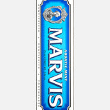A 75 ml box of MARVIS Aquatic Mint Toothpaste, featuring distinctive blue and white packaging with an illustrated emblem at the top—an icon of Italian oral care elegance.