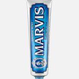 A tube of MARVIS Aquatic Mint Toothpaste, distinguished by its blue and silver retro-inspired packaging and upright orientation with the cap at the bottom, exemplifies iconic Italian design that brings elegance to your daily routine.