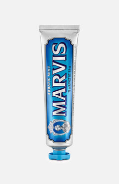 A tube of MARVIS Aquatic Mint Toothpaste, distinguished by its blue and silver retro-inspired packaging and upright orientation with the cap at the bottom, exemplifies iconic Italian design that brings elegance to your daily routine.