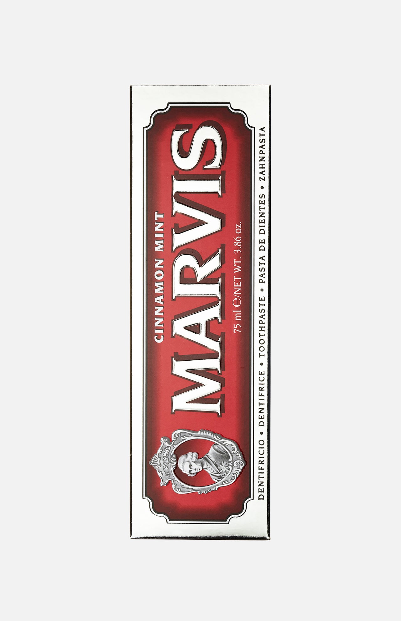 Box of MARVIS Cinnamon Mint Toothpaste, 75 ml (3.8 oz), set against a red background with silver trim. This premium Italian toothpaste displays the MARVIS logo and an ornate emblem on the front of the packaging, emphasizing its unique cinnamon mint flavor.