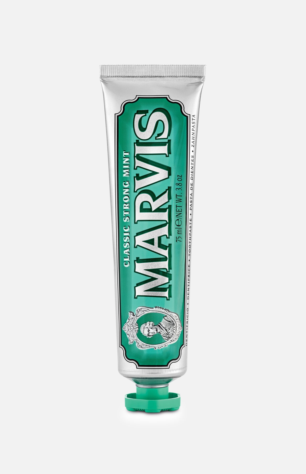 A silver and green tube of MARVIS Classic Strong Mint Toothpaste stands upright with the cap at the bottom. This Italian-made toothpaste features a concentrated paste formula and displays the MARVIS logo along with product details.