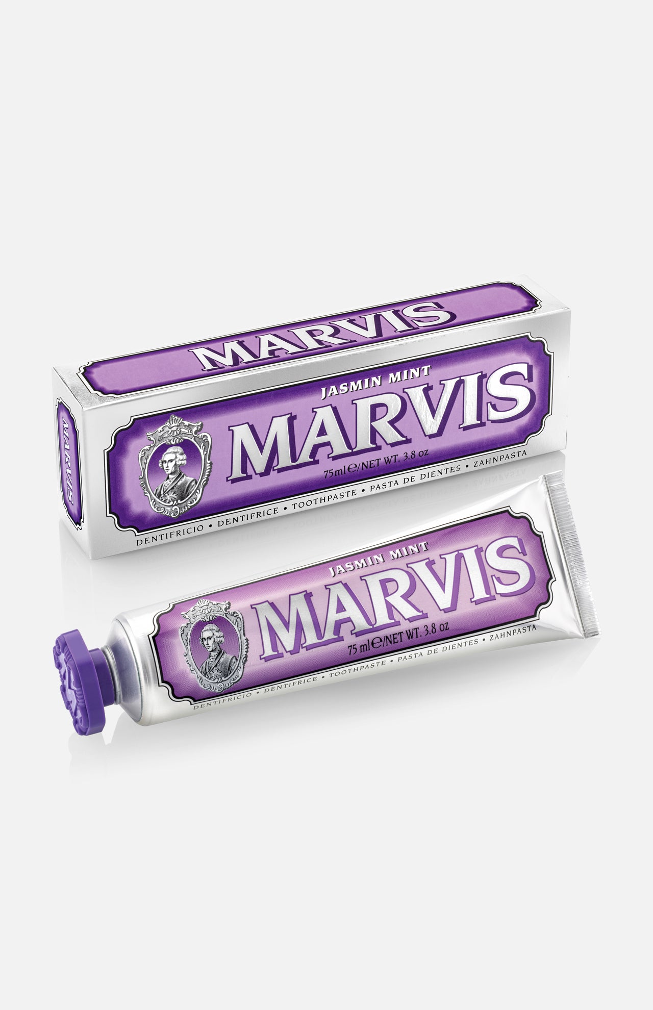 A box and tube of MARVIS Jasmin Mint Toothpaste are pictured. Both feature purple and silver vintage-style packaging with a portrait logo, representing the Italian-made luxury toothpaste from MARVIS; the tube rests in front of its matching box.