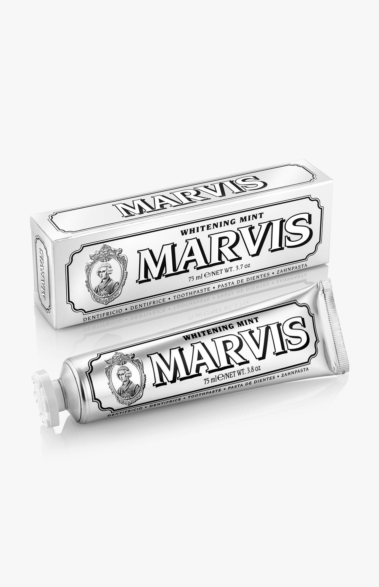 A tube and box of MARVIS Whitening Mint Toothpaste are pictured. This Italian-made toothpaste features white packaging with black text and decorative details. The tube displays the product name "Marvis Whitening Mint Toothpaste" along with "75 ml / 3.8 oz.", emphasizing its teeth whitening formula.