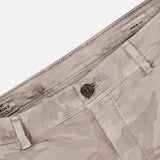 Close-up of MASON'S Camo Eisenhower Style NY Fit Trouser Pant in beige camouflage, showing waistband, button closure, belt loops, pockets, and a partially visible interior label. Made from stretch cotton fabric.