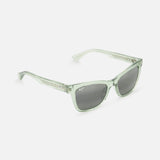 The MAUI JIM Hiwahiwa Butterfly Green Sunglasses feature translucent light green cat-eye frames with dark lenses, shown angled against a plain white background.