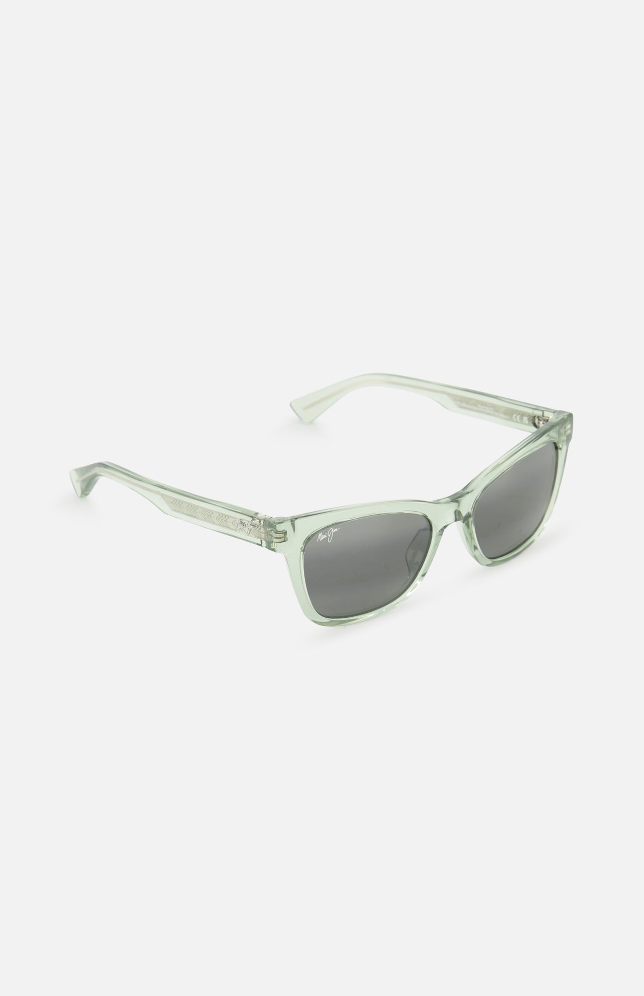 The MAUI JIM Hiwahiwa Butterfly Green Sunglasses feature translucent light green cat-eye frames with dark lenses, shown angled against a plain white background.