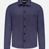 The MAURIZIO BALDASSARI Light Classic Overshirt is a dark blue, long-sleeve cashmere shirt with a single chest pocket, black buttons, and a classic collar. Made in Italy for lightweight layering. Displayed on a plain white background.
