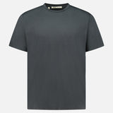 The Linate Short Sleeve T-Shirt by MAURIZIO BALDASSARI is a dark gray, crew neck T-shirt with short sleeves, made in Italy and shown against a white background.