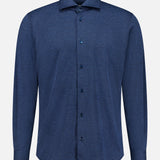 The MAURIZIO BALDASSARI Santini Spread Collar Shirt, a long-sleeved, button-up collared shirt in a solid dark blue hue, is displayed against a plain white background—an ideal addition for elevating your smart casual wardrobe.