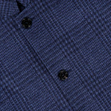 Close-up of the MAURIZIO BALDASSARI Stendhal Stand Collar 4 Button Jacket, showcasing its blue plaid patterned fabric and stand collar design.