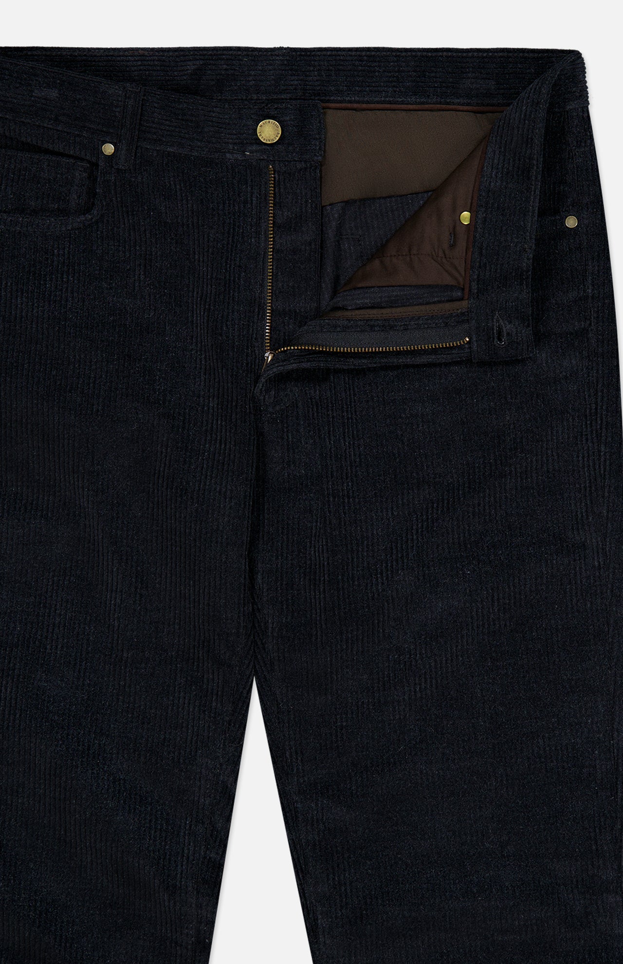 A close-up of the Treves Five Pocket Corduroy Pants by MAURIZIO BALDASSARI in black, featuring an unzipped fly that reveals a brown inner lining and gold buttons. Expertly crafted in Italy, these pants showcase refined craftsmanship and timeless style.