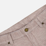 Close-up of the waistband and front pockets of the MAURIZIO BALDASSARI Treves Five Pocket Corduroy Pants in light beige, made in Italy, featuring a brass button and belt loops, laid flat against a white background.
