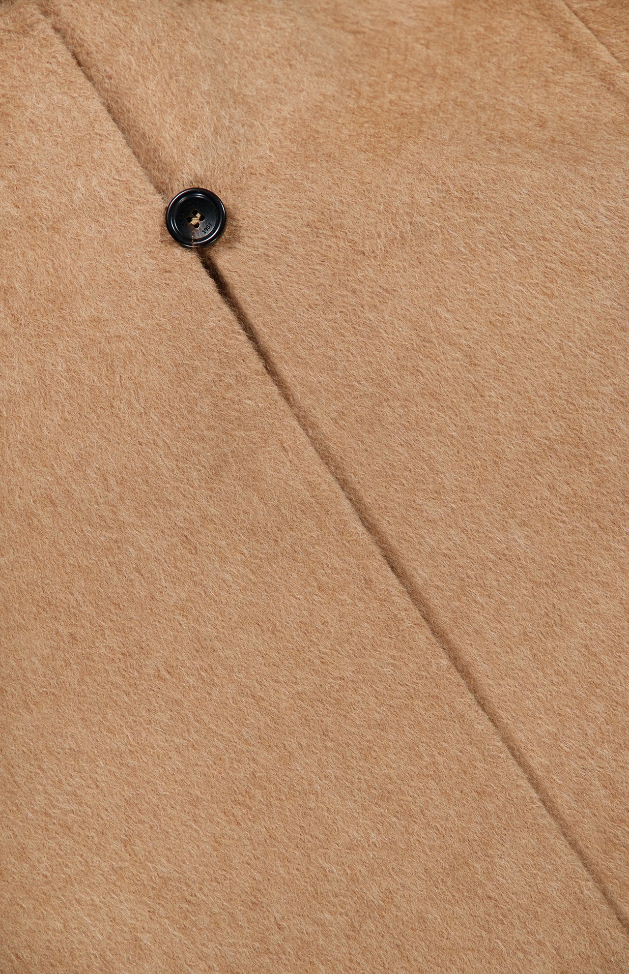 Close-up of a tan Short Wrap Coat with Belt, featuring a single visible button on the front placket.