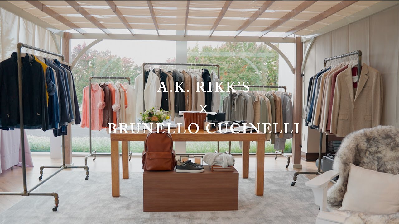 image with text "A.K. Rikk's Brunello Cucinelli" image is of a installation of Brunello Cucinelli Fall and Winter collections