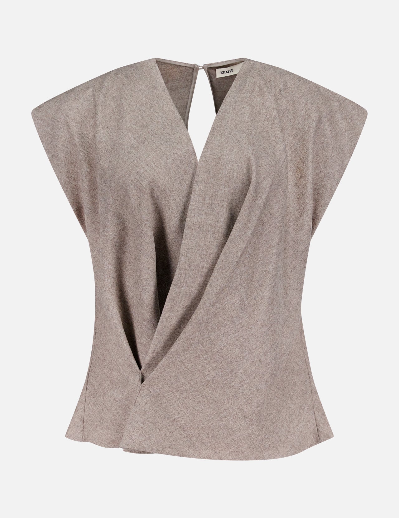 The Mer Cap Sleeve Wrap Top by KHAITE is a sleeveless taupe wool-cashmere piece with a V-neck, structured shoulders, draped wrap design, and a subtle back keyhole—ideal for minimalist wardrobes.