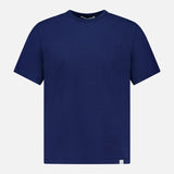 The Classic Jersey T-shirt by Merz B. Schwanen is a plain navy blue short-sleeve tee crafted from mid-weight jersey, featuring a classic crew neck and shown against a white background.