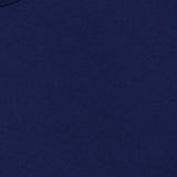 Close-up of the Merz B. Schwanen Classic Jersey T-shirt, highlighting the collar and a glimpse of the branded tag. The mid-weight jersey fabric displays a smooth texture, reflecting renowned heritage craftsmanship.